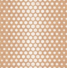 a beige and white rug with hexagonal shapes