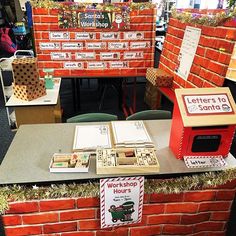 a table with some red bricks on it and other items sitting on top of it