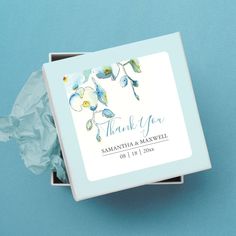 a blue box with some white flowers on it