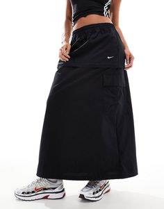 Skirts by Nike Skirt season: pending 2-in-1 design High rise Elastic waist Logo embroidery Functional pockets Regular fit Mini Pleated Skirt For Streetwear, Summer Black Maxi Skirt With Pockets, Fitted Streetwear Skirt With Pockets, Fitted Skirt With Pockets For Streetwear, Black Cargo Skirt For Summer Streetwear, Black Tiered Skirt With Pockets, High-waisted Black Cargo Skirt For Streetwear, Summer Streetwear Cargo Skirt, Black Mini Cargo Skirt For Streetwear