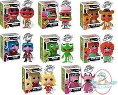 the muppets pop vinyl figures are on display in their packaging boxes, including one with