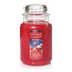 yankee candle jar filled with red liquid