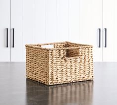 an empty wicker basket sitting on top of a counter