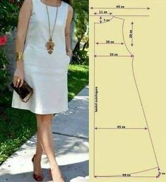 a woman in a white dress is standing next to a drawing and the measurements for her dress