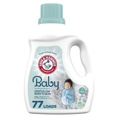 a bottle of baby gentle on baby's skin with the label 47 loads in front of it