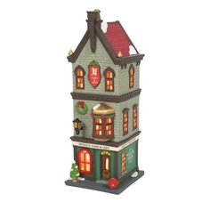 a toy doll house with lights and decorations