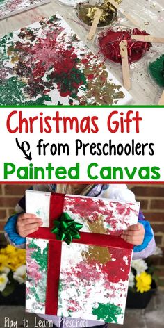 a child holding a christmas present with paint on it and the words, christmas gift q from preschoolers painted canvass