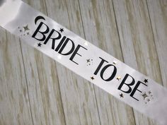 a bride to be sash with stars on it