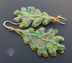 Autumn Oak leaves earrings are the perfect way to welcome autumn! Earrings made by hand from high-quality polymer clay, colours do not wash out and don't fade in the sun. Single copy, 100% Handmade OOAK earrings. All items are shipped from my home within 1-3 business days after payment confirmation. Please, contact me with any questions. I make some custom orders. If you would like some items to be custom made or created for you in a special way, feel free to send an Etsy conversation with your Handmade Leaf-shaped Earrings, Handmade Leaf-shaped Nature-inspired Earrings, Handmade Nature-inspired Resin Earrings, Nature-inspired Handmade Resin Earrings, Handmade Leaf-shaped Earrings For Gift, Handmade Green Leaf-shaped Jewelry, Green Leaf-shaped Earrings For Gift, Green Leaf-shaped Earrings As A Gift, Handmade Green Leaf-shaped Earrings