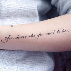 a woman's arm with the words you choose who you want to be