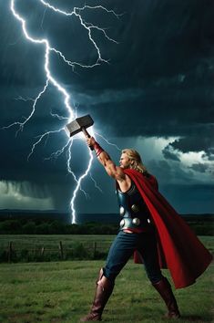 a man dressed as thor is holding an ax in front of a lightning storm with his hands