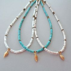 "* Seashell Beaded Necklace * * Choose from Mother of Pearl, Turquoise, or Howlite * * Fits 15\"-18\" Neck - if you need a different length, leave me a message * Details: * 2x4mm Heishi beads * Gold Seashell Charm * Gold Hematite Spacers * Gold Stainless Steel Chain & Clasp ★ Turquoise serves as a bridge between the spiritual and the physical aiding communication between the realms. It's the stone of honest, truthful communication. It provides strength, protection, and purifies energy. ★ Pearls Beach Turquoise Heishi Beads Necklace, Gold Beaded Turquoise Necklace For Beach, Gold Turquoise Necklace With Round Beads For Beach, Turquoise Beaded Shell Necklace Strand, Turquoise Shell Necklace With Round Beads, Seashell Bead Necklace, Necklaces Summer, Summer Beach Jewelry, Les Chakras