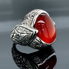 Mens Handmade Red Agate Ring , Turkish Handmade Red Agate Stone Ring, Dark Red Agate Gemstone Ring , 925 Sterling Silver Ring ,Gift For Men ★Item Details • Gender : Male / Female• Material : 925K Sterling Silver• Total weight : 20 Grams• Gemstone Agate Stone• Stone Size : 15x20 mm ✔ Ready to Ship in 1-2 Business Days ..✔ Shipped to the Worldwide 1-5 business days with free shipping...✔ The product will be sent to you with a handmade wooden box to avoid any damage during shipping...✔ Visit our store, browse other Men's jewelry, silver and gold collections, and find the perfect piece you're looking for... Red Carnelian Signet Ring With Polished Finish, Classic Red Agate Jewelry, Red Carnelian Signet Ring For Anniversary, Emerald Stone Rings, Mystic Topaz Ring, Malachite Rings, Lapis Lazuli Ring, Citrine Stone, Leather Cuffs Bracelet