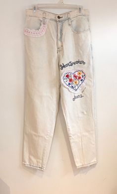 "Vintage 90s Heartbreaker acid wash jeans by Jou Jou in excellent condition. Size Women's US 11/12 Waist 30\" Rise 13\" Hips 40\" Inseam 27\" Leg opening 12\" Free domestic shipping!" Spring Stonewashed Cotton Jeans, Retro Jeans With Graphic Print For Spring, 90s Washed Jeans For Spring, 90s Inspired Light Wash Cotton Jeans, 90s Style Washed Jeans For Spring, White Retro Jeans With Relaxed Fit, White Retro Relaxed Fit Jeans, 90s Style Cotton Jeans For Spring, White Relaxed Fit Retro Jeans