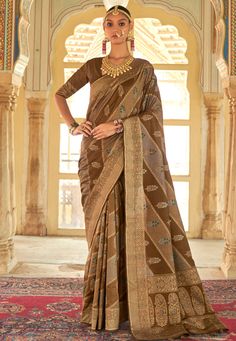 Brown silk saree with blouse 486A Desc: Color : Brown Fabric : Silk Wash Care : Dry clean Sleeve Style : Half Sleeve Long Sleeves : Done only in Custom Stitch Sleeves Lining : Done only in Custom Stitch Bust Size : 32 to 42 Inches Occasion : Temple Wear Social Gathering Pongal Gudi Padwa Onam Ugadi. With Express Free Shipping Buy Indian Party wedding and bridal sarees Brown silk saree with blouse 486A online in USA, UK and Canada from KollyBollyEthnics.com Brown Silk Saree, Indian Garments, Reception Saree, Wedding Wear Saree, Classic Saree, Indo Western Gown, Indian Wedding Sarees, Party Wear Gowns, Gown Party Wear