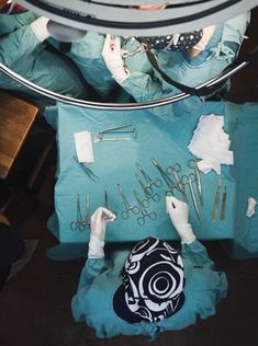 surgeons are performing surgery in an operating room