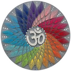 the om sign is surrounded by colorful feathers