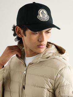 Moncler's logo is easily recognisable, even when it's pixellated. This baseball cap is made from cotton-twill and appliquéd with a blurred patch bearing its emblem. Luxury Hats With Logo Patch And Curved Brim, Luxury Black Baseball Cap With Curved Bill, Luxury Black Curved Bill Baseball Cap, Cotton Baseball Cap With Logo Detail, Cotton Snapback Baseball Cap With Logo, Luxury Snapback Hat With Embroidered Logo, Luxury Baseball Cap With Logo Patch, Luxury Cap With Logo, Luxury Logo Cap