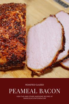 sliced ham on a wooden cutting board with the words roasted glazed peameal bacon