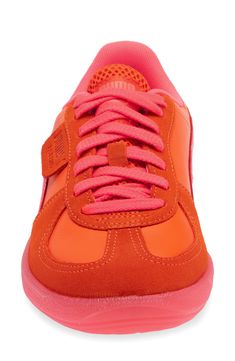 A low profile and classic T-toe keep the soccer vibes alive and kicking in an '80s-throwback sneaker reissued in mixed leathers for a sneakerhead win-win. Lace-up style Leather upper/textile lining/rubber sole Imported Orange Sporty Sneakers For Spring, Sporty Orange Sneakers For Spring, Retro Orange Leather Sneakers, Retro Pink Sports Sneakers, Retro Pink Sneakers For Sports, Orange Casual Sneakers With Perforated Toe Box, Casual Orange Sneakers With Perforated Toe Box, 80s Throwback, Puma Palermo