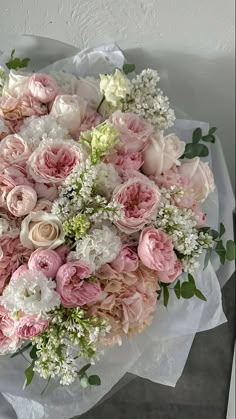 a large bouquet of pink and white flowers