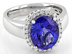 3.50ct Oval Tanzanite With 0.25ctw Round White Diamond Platinum Ring. Measures Approximately 0.50"L x 0.54"W. Oval Gemstones With Halo Setting For Formal Occasions, Classic Oval Gemstones With Halo Setting, Gia Certified Oval Halo Ring, Oval White Gold Gemstones With Halo Setting, Gia Certified Oval Silver Gemstones, Gia Certified Silver Oval Gemstones, Platinum Diamond Rings, Tanzanite Ring, Jtv Jewelry