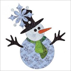 a snowman is wearing a black hat and green scarf