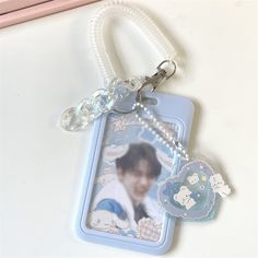 a keychain with an image of a person on it