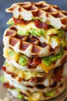 bacon and avocado grilled cheese waffles are stacked on top of each other