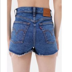 New With Tags. Slim-Fit Denim Shorts From Levi's Cut With A Super High Rise. Rigid Denim Cut With A Raw Hem For Casual Styling. Essential 5-Pocket Design Finished With A Button Fly. - 100% Cotton - Machine Wash - Model Is 5’10” And Wearing Size 27 Standard Measurements: - Rise: 11.5” - Inseam: 2” Ripped Dark Wash Short Bottoms, Fitted Cutoff Dark Wash Bottoms, Fitted Dark Wash Cutoff Bottoms, Dark Wash Denim Cutoff Bottoms, Mid-rise Denim Blue Jean Shorts With Belt Loops, Cutoff Denim Blue Shorts With Belt Loops, Denim Blue Cutoff Shorts With Belt Loops, Ripped Denim Blue Short Length Bottoms, Denim Blue Ripped Shorts