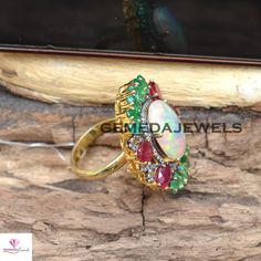 AAA+ Quality Opal Gemstone Ring, Emerald 925 Silver Ring, Ruby Gemstone Jewelry, Pave Diamond Ring, Gold Vermeil Jewelry, Wedding Jewelry Gross Weight: 12.01 gram Gemstone Weight: 17.10 cts Diamond Weight: 0.60 cts Ring Size: 33X27 MM NOTE:- All The Products Are Designed And Manufactured In My Workshop By Me & My Team. Shown Products Are Purely Handmade. Custom Orders Are Open Handly Accepted. We Are the Perfect Choice For Any Custom Jewelry Manufacturing. For Bulk Orders Please Message me. Fine Jewelry Opal Ring With Multi-stone For Anniversary, Multi-stone Cubic Zirconia Emerald Ring For Wedding, Oval Multi-stone Emerald Ring For Wedding, Heirloom Multi-stone Cubic Zirconia Rings, Oval Multi-stone Gemstones For Wedding, Round Multi-stone Cluster Ring For Wedding, Multi-stone Cluster Ring For Wedding, Sterling Silver Multi-stone Ring For Wedding, Multi-stone Birthstone Ring For Wedding