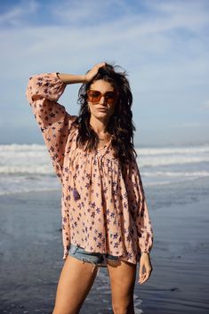 Printed Blouse With Long Sleeves Color: Coral Size: One Size, Fits Size 2 to 10 100% Indian Cotton Made in India Spring Vacation Long Sleeve Peasant Top, Long Sleeve Peasant Top For Spring Vacation, Vacation Floral Print Long Sleeve Blouse, Long Sleeve Floral Print Top For Beach, Long Sleeve Beach Tops With Floral Print, Long Sleeve Tops With Floral Print For Beach, Long Sleeve Floral Print Tops For The Beach, Long Sleeve Floral Print Blouse For Vacation, Long Sleeve Cotton Blouse With Boho Print