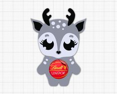 a paper cut out of a reindeer holding a red ball with the word lind'o on it