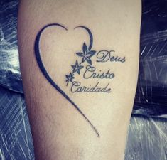 a heart tattoo with the words desus cristoo candide on it