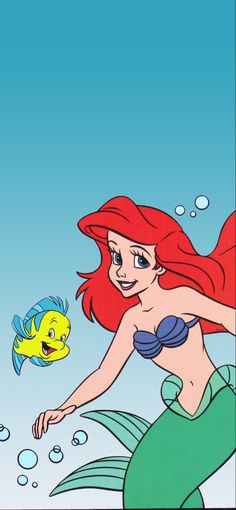 ariel from the little mermaid with an orange fish in it's mouth and green hair