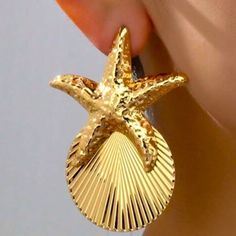 Golden Starfish And Shell Earrings For Sale! These Earrings Are Absolutely Gorgeous, And Adorable. They Are New, Have Never Been Worn, And Are From My Boutique! They Are Made For Pierced Ears, And Are Almost 3 Inches Tall And About 2 Inches Wide. Actual Measurements Of The Earrings Is In The Last Image. Such A Cute Earrings To Add To Your Jewelry Collection! Gold Star Earrings For Summer, Elegant Star-shaped Summer Earrings, Elegant Star-shaped Earrings For Summer, Elegant Summer Star-shaped Earrings, Gold Star-shaped Earrings For Beach, Elegant Starfish Earrings For Summer, Star Shaped Summer Party Earrings, Earrings For Sale, Shell Earrings