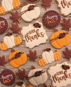 decorated cookies are arranged on a table for the thanksgiving day celebration to be enjoyed by all