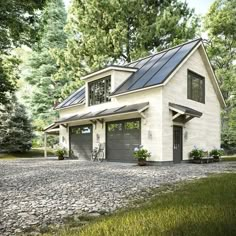 this is an artist's rendering of a modern house in the woods with stone driveway