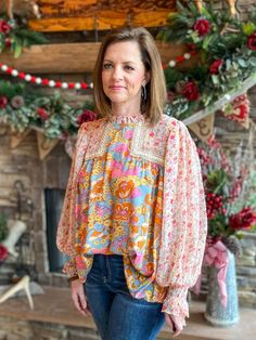 Look blooming fabulous in this Grace Multi-Floral Blouse! From the frill mock neck to the sheer bubble sleeves, this playful top will have you living your best floral fantasy. Plus, the smocked cuffs provide a flattering and comfortable fit. Get ready to brighten up the room! Relaxed fit. I am in the small. You can size down. Sizes: Small-Large 100% Rayon Follow tag instructions for washing. The Room, Floral Blouse, Live For Yourself, No Frills, Mock Neck, Comfort Fit, Relaxed Fit, Floral