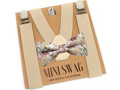 "Your guy will be the talk of the evening when he arrives sporting this beautiful Dusty Rose and Champagne floral bow tie and khaki suspenders!  This set is perfect for a ring bearer outfit, page boy wedding outfit, cake smash or family photo shoot!  This print also comes in an adult necktie and pocket square. The fully adjustable khaki suspenders come in multiple sizes are made with extremely stretchable elastic for a comfortable fit.  The silver clasps easily attach to most clothing. This 100% Dusty Rose Wedding Ring Bearer, Wedding Outfit For Boys, Bearer Outfit, Groomsmen Wedding, Ring Bearer Outfit, Floral Bow Tie, Kids Bow Ties, Suspenders Set, Grey Roses