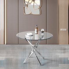 a glass table with two wine glasses on it in front of a wall mounted clock