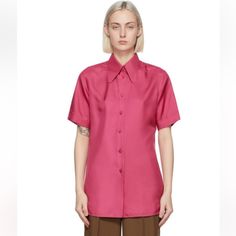 Short Sleeve Silk Twill Shirt In Pink. Spread Collar. Button Closure At Front. Rolled Cuffs. Shirttail Hem. Logo Engraved Gold-Tone Hardware. Comes Wrapped In Gucci Tissue, With Extra Button/Tags. Nwt. Size 40 (Fits A Women S-M). Make An Offer! Gucci Collared Blouse For Spring, Gucci Spring Collared Blouse, Elegant Gucci Button-up Blouse, Gucci Button-up Shirt For Spring, Gucci Button-up Blouse For Formal Occasions, Gucci Collared Blouse For Formal Occasions, Gucci Formal Button-up Blouse, Gucci Formal Collared Blouse, Chic Gucci Collared Blouse