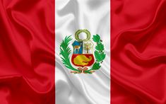 the flag of peru waving in the wind