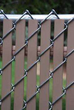 a close up view of a fence that is made of metal