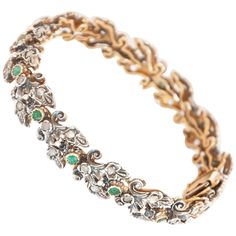 An antique Edwardian 18 karat gold and silver link bracelet set with vibrant emeralds and diamonds. The bracelet consists of fourteen faceted emerald stones with a vivid green color. The emeralds are surrounded by many diamonds. The bracelet is beautifully linked together in an 18k gold and silver bezel setting. Once the bracelet is secured, there is also an eight-safety pin at the closure. Emerald symbolism encompasses not only royalty but also wit, eloquence, and foresight. Emerald symbolism e Retro Bracelet, Silver Link Bracelet, Gold Link Bracelet, Gold Armband, Floral Bracelet, Gold Link, Lovely Jewellery, Vibrant Green, Vintage Bracelets