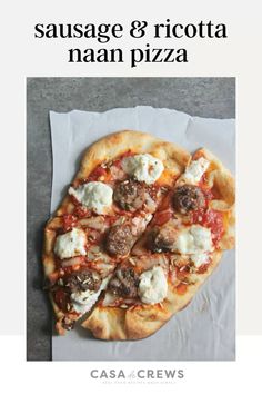 a pizza with meatballs and cheese on it