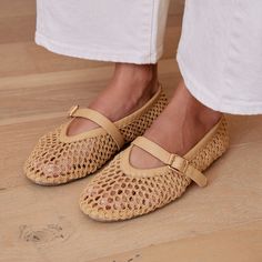 Elevate your look with our natural-tone fishnet Mary Jane ballet flats! They feature a chic buckle closure for timeless style and all day comfort. Shop Now! Espadrilles Ballet Flats, Anthropologie Shoes Flats, Summer Ballet Flats, Ballet Flats Parisian, French Sandals Shoes, French Casual Shoes, Woven Ballet Flats, Mesh Mary Janes Outfit, Mesh Ballet Flats