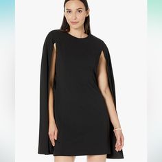 Elevate Your Wardrobe With This Stunning Calvin Klein Mini Dress In Classic Black. The Dress Features A Trendy Scuba Cape Design That Adds A Touch Of Sophistication. Perfect For Any Occasion, This Dress Is Made For The Modern Woman Who Wants To Look Chic And Stylish. Crafted From Premium Materials, This Dress Is Sure To Make You Feel Comfortable And Confident. Designed For Regular Size Women, It Is Available In Size 4. The Dress Length Is Short, Making It A Great Choice For Any Casual Or Formal Cape Dress Short, Cape Designs, Calvin Klein Shorts, Cape Dress, Calvin Klein Dresses, Calvin Klein Black, Look Chic, Womens Calvin Klein, Modern Woman