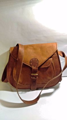 Up for sale: 13" Brown Vintage Satchel/Hand Bag for Women 13" x 12" X 4"  Condition:  like new missing tag      Shipping: Free Shipping only within the local 48 states      *we do not offer international shipping at this time* Brown Satchel For Travel, Classic Handmade Satchel As Gift, Vintage Square Satchel As Gift, Large Brown Satchel, Vintage Tote Satchel As Gift, Handmade Rectangular Saddle Bag For Travel, Vintage Brown Satchel With Leather Lining, Vintage Brown Shoulder Satchel, Brown Vintage Satchel For On-the-go