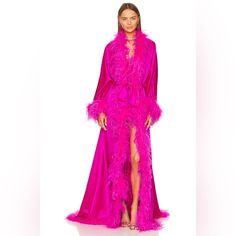 New With Tags. Bring On The Drama In Retrofete’s Neon Pink Juno Robe. This Over-The-Top Floor Length Silk Robe Features Ostrich Feather Trim Ties At The Waist And Was Designed To Make An Entrance Unlike Any Other. Self: 76% Acetate, 24% Polyester Trim: 100% Ostrich Feather (Ostrich Feathers Can Be Removed With A Button) Made In China Dry Clean Only Detachable Waist Tie Closure Midweight Sateen Fabric With Dyed Feather Trim Revolve Style No. Rofr-Wo83 Manufacturer Style No. Hl23-6494 Tags: Revolv Pink Feather Robe, Fancy Robe, Fancy Robes, Ostrich Feather Trim, Revolve Style, Feather Trim, Top Floor, Ostrich Feather, Silk Robe